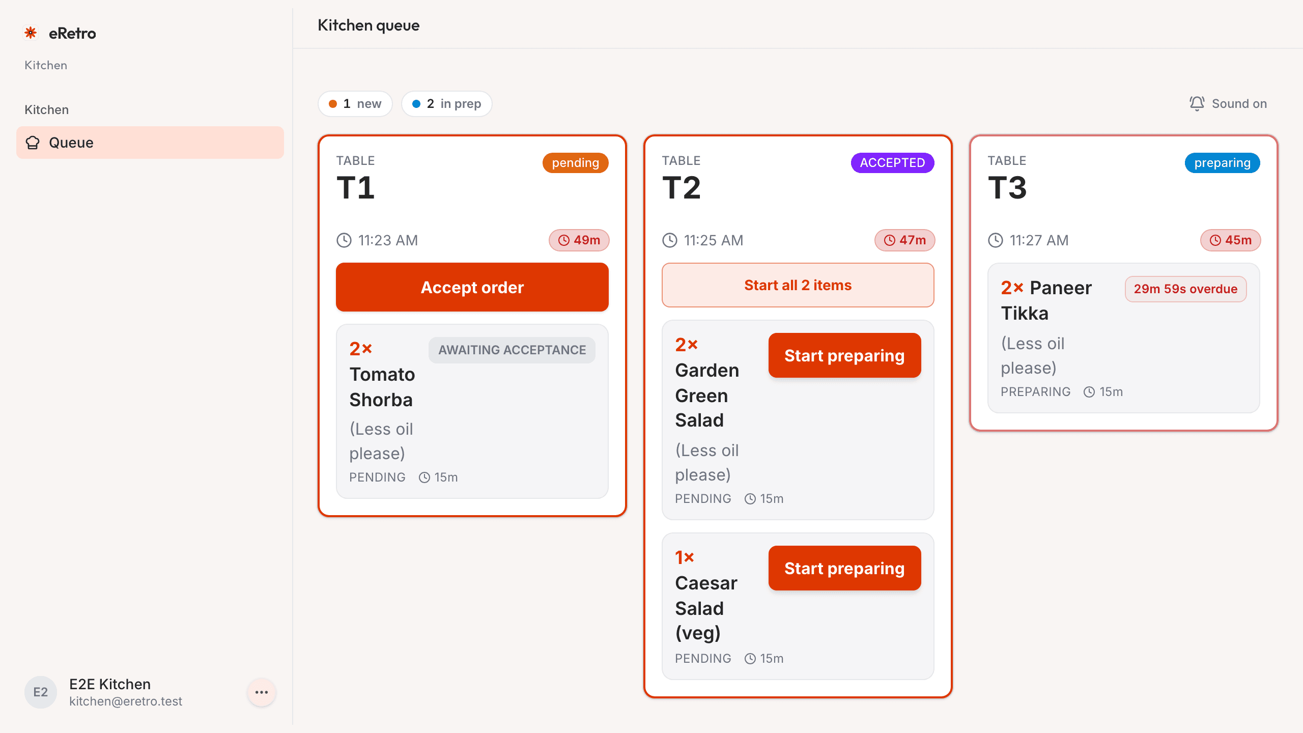 The kitchen display screen showing incoming tickets grouped by preparation state.